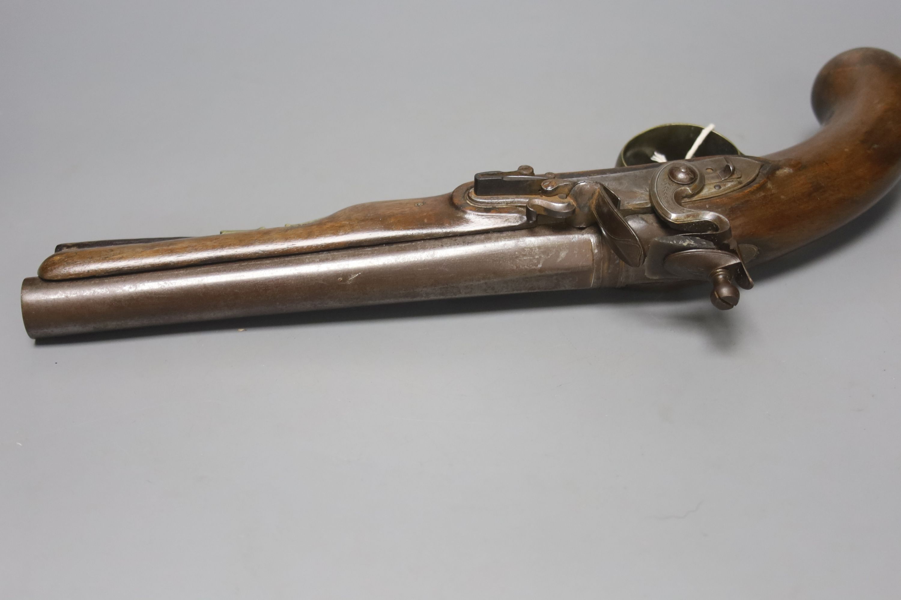 A flintlock coach pistol, circa 1820 by John and William Calvetrt of Leeds, approx. 35cm long